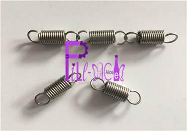 Springs for washing clamps on bottle washing machine